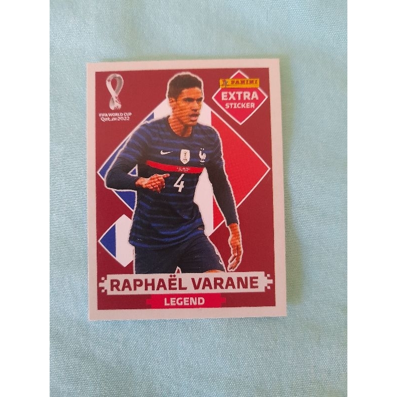 EXTRA STICKER BORDO ( RAPHAEL VARANE )