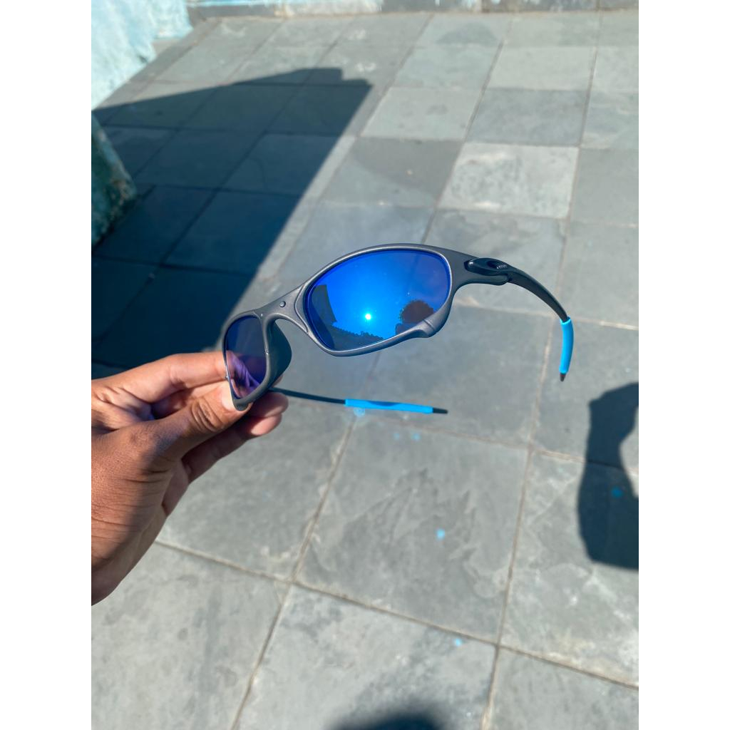 ÓCULOS DE SOL OAKLEY JULIET - LENTE AZUL DARK BLUE ARMAÇÃO CINZA