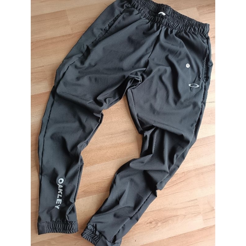 Calça store tactel oakley