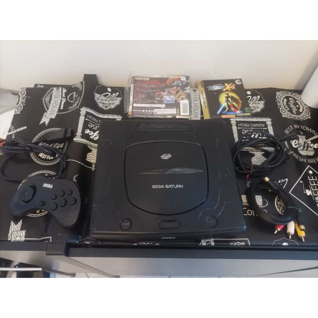 Video game sega saturno 127v com rockmanx4 controle e cabos