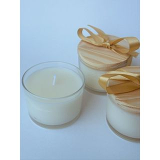 Vela perfumada em copo de vidro laranja-canela 150g. magic lights