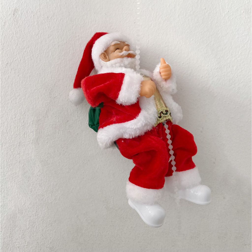 PAPAI NOEL ELETRONICO ALPINISTA 25CM COM LUZ NO PE Toca Música Brinquedo Enfeite Natal