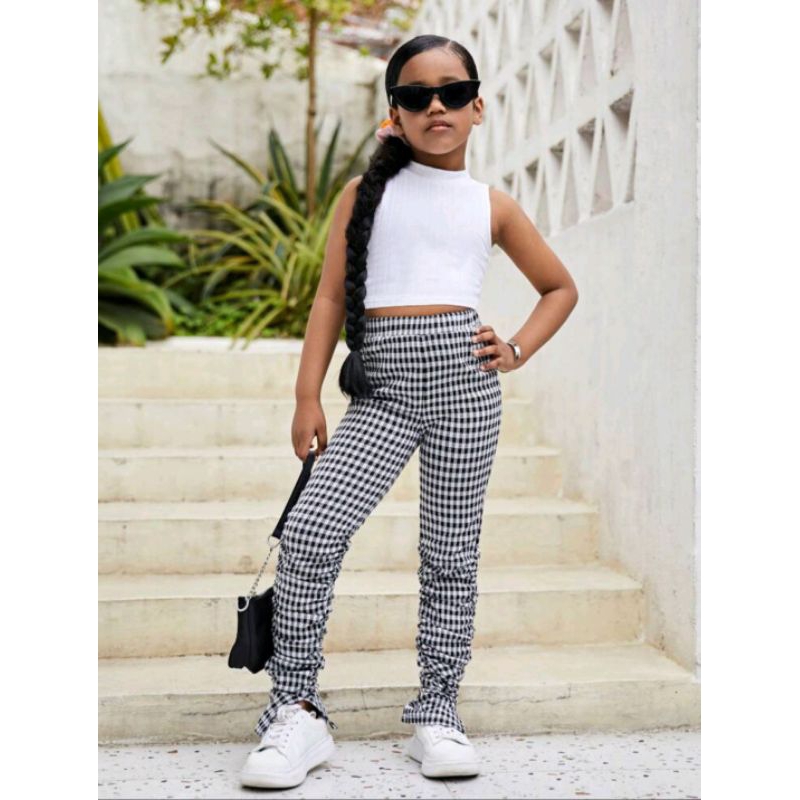 Calça infantil juvenil xadrez preta e branca em lã batida com abertura no  calcanhar bem blogueira para menina