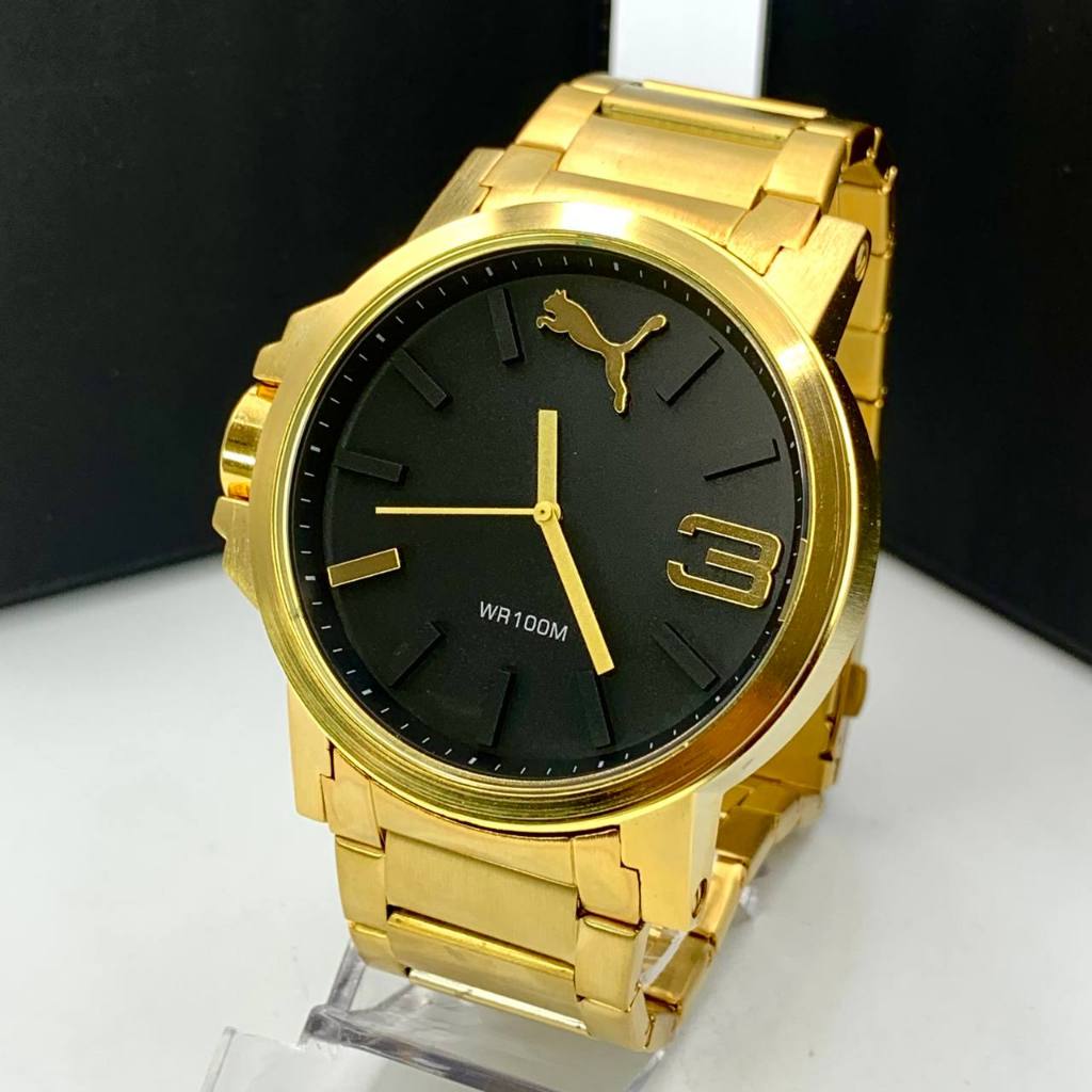 Relogio puma hot sale dourado masculino