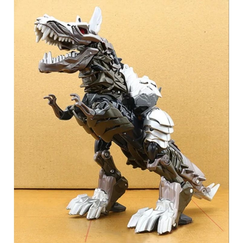 Boneco Grimlock Transformers Dino Vira Robô 18cm Cinza | Shopee Brasil