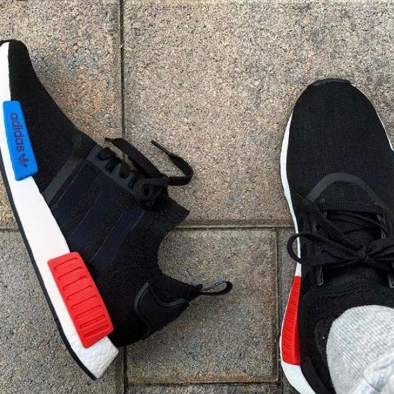 Nmd vermelho e store azul