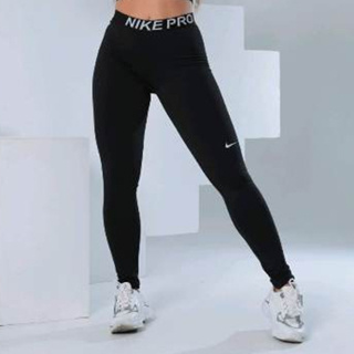 Camiseta Nike Yoga Dri-Fit Feminina - Roxo+Verde