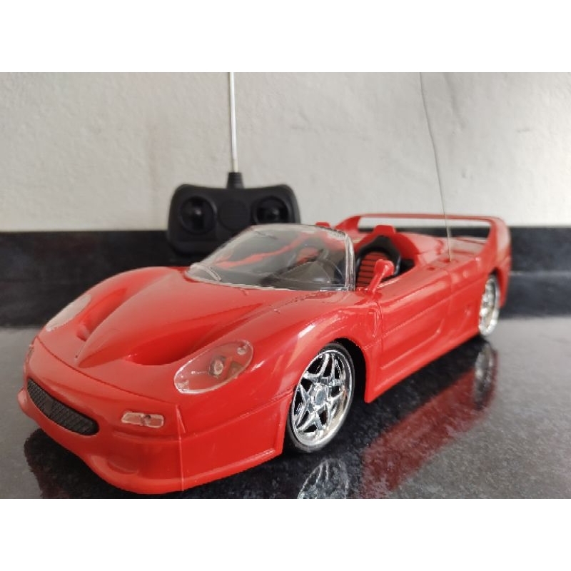 Ferrari F50 conversível controle remoto anos 90. | Shopee Brasil