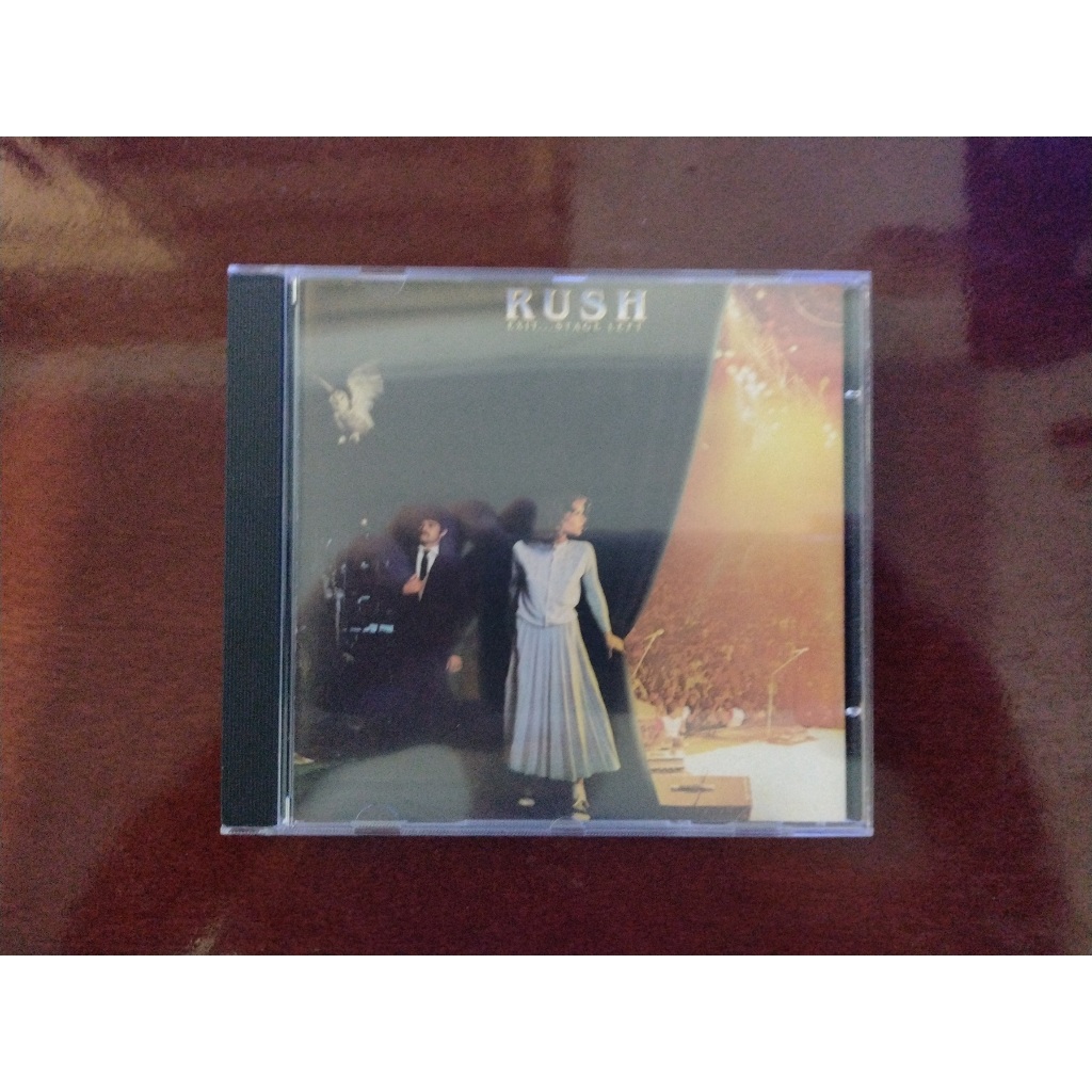 CD RUSH - EXIT STAGE LEFT - IMPORTADO