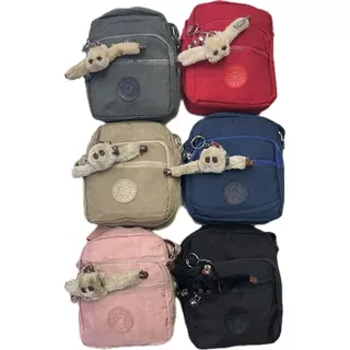 Bolsa feminina pequena casual de nylon crossbody e chaveiro de macaco