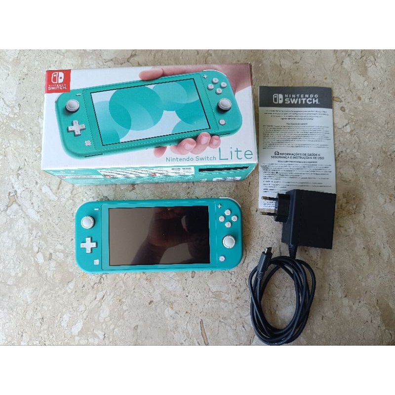 Nintendo Switch lite turquesa verde completo
