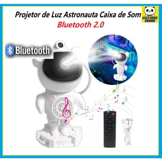 Projetor de Luz Astronauta Caixa de Som Bluetooth 2ª Geração: A Caixinha de Som Astronauta Bluetooth oferece uma experiência única! Com projetor estelar, luminária e a funcionalidade de caixa de som Bluetooth, proporciona criatividade e entretenimento. De