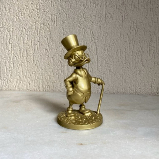 Tio patinhas dourado