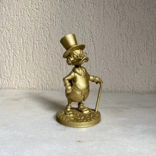 Tio patinhas dourado