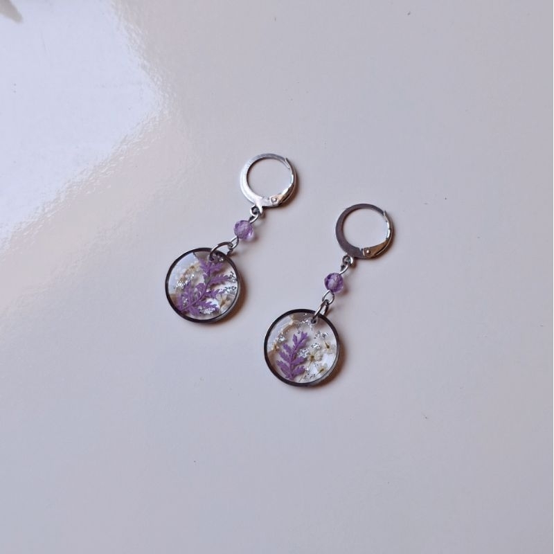 brinco floral roxo