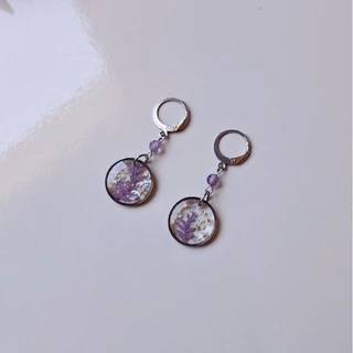 brinco floral roxo