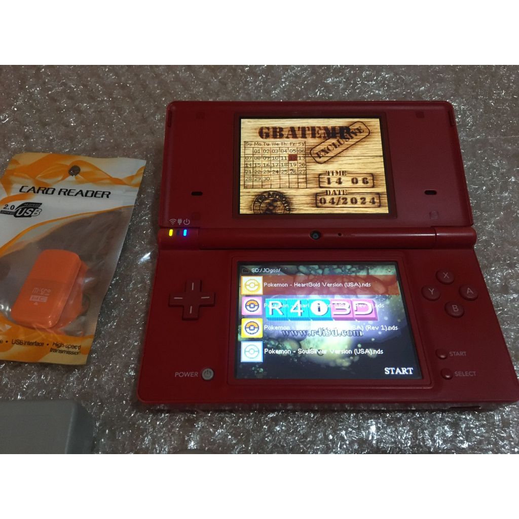 Gameboy DS with 27 selling games and charger