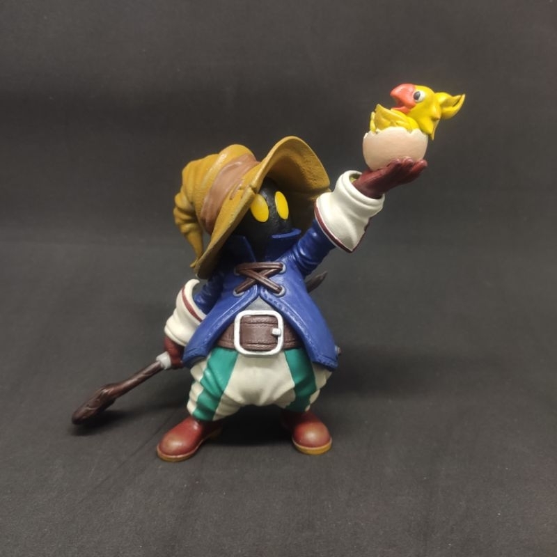 Final Fantasy Vivi e Chocobo Boneco Colecionável