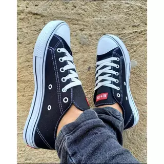 tênis allstar.