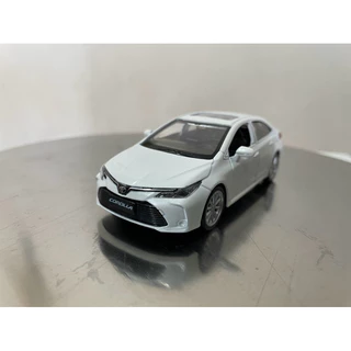 Miniatura Toyota Corolla Hybrid edição Premium Carrinho Coleção