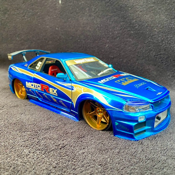 JADA TOYS 1:24 IMPORT RACER MOTOREX NISSAN SKYLINE GT-R R34