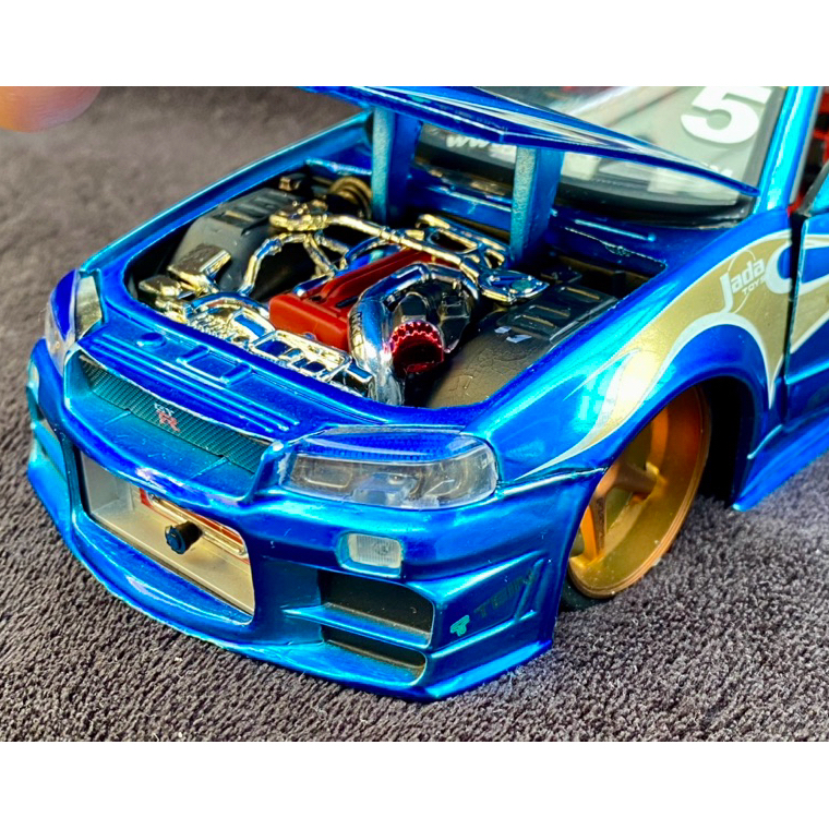JADA TOYS 1:24 IMPORT RACER MOTOREX NISSAN SKYLINE GT-R R34