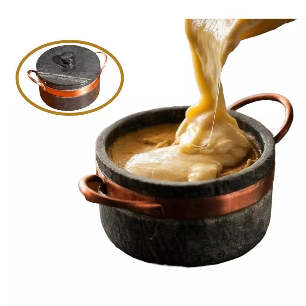 fondue de pedra sabão com queijo derretido