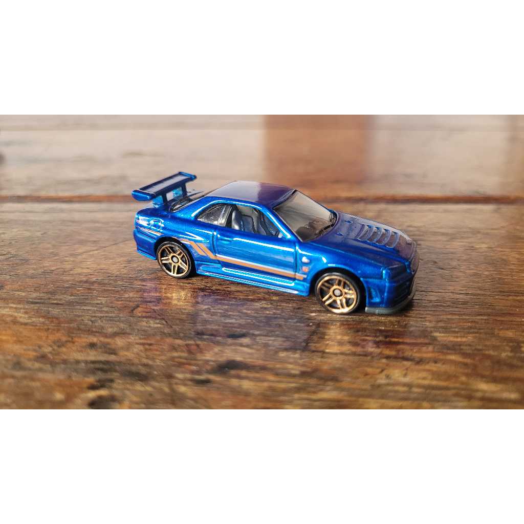 thumbnail image 2 of Hot Wheels 2014 Nissan Skyline GT-R R34 - Black Seychelles 2 of 14