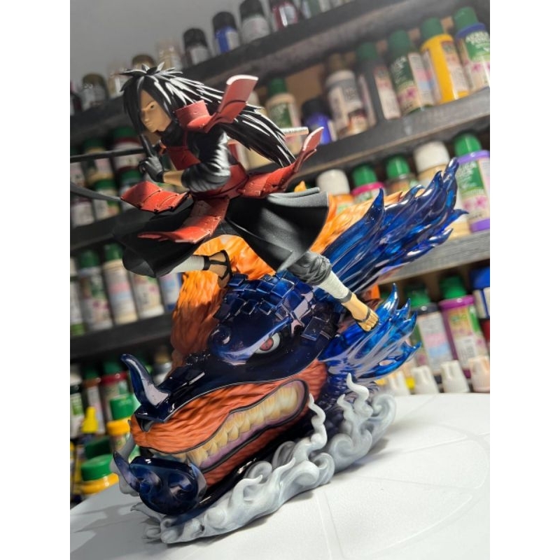 Madara uchiha e Kurama do anime Naruto
