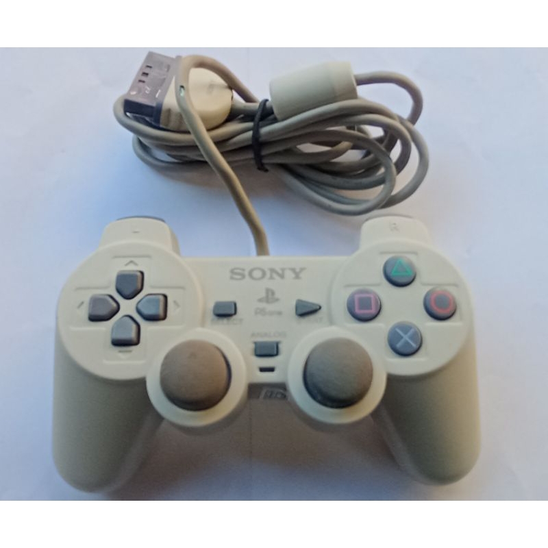 controle original usado Playstation 1.