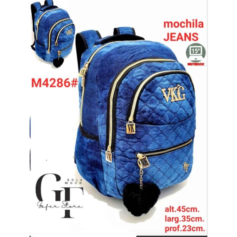 Mochila jeans com shops pompom