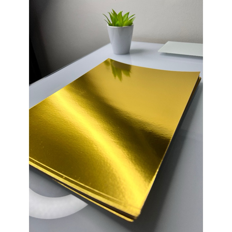 Papel Laminado Lamicote 250g Dourado - 50 folhas | Shopee Brasil