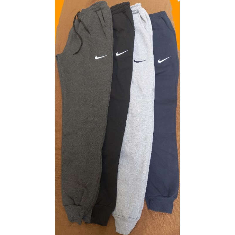 calça moletom masculina con punho elástico com bolso flanelado