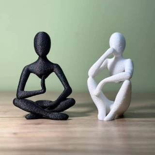Escultura Homem Equilibrista