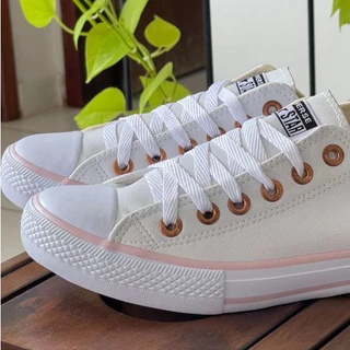 tenis branco com rosa cano baixo