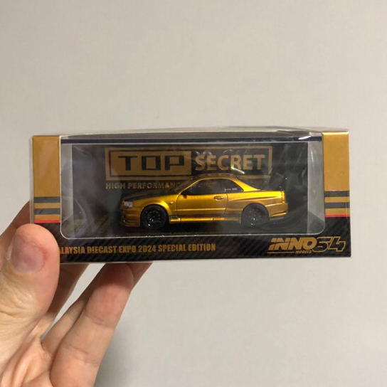 Nissan GT-R R34 Top Secret Oro Inno64 1/64 | Modello MDX EXPO 2024 - Nuovo Dal Regno Unito