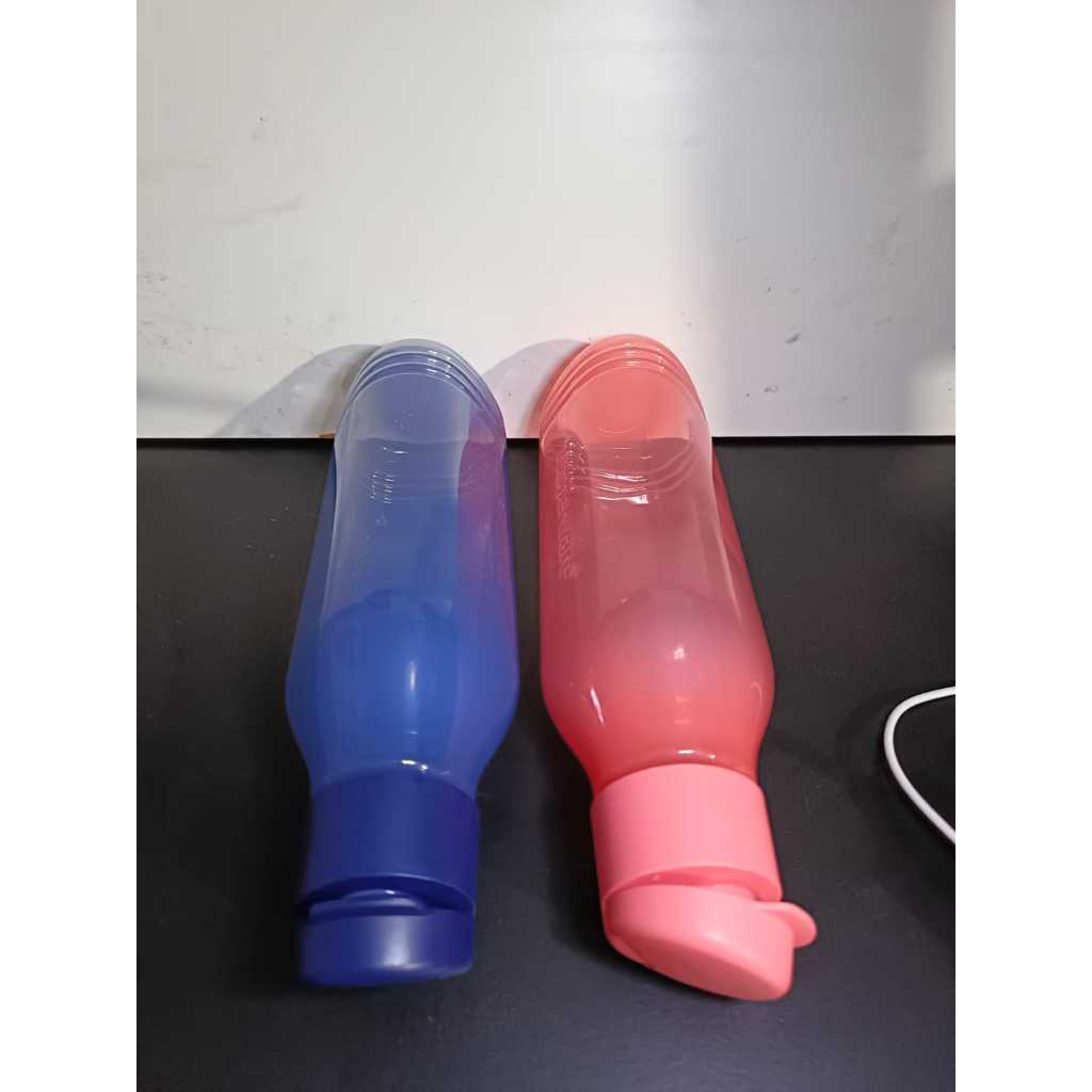 Garrafa triangular tupperware 750ml | Shopee Brasil