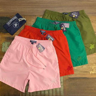 Bermuda short praia Vile acqua print revela na água