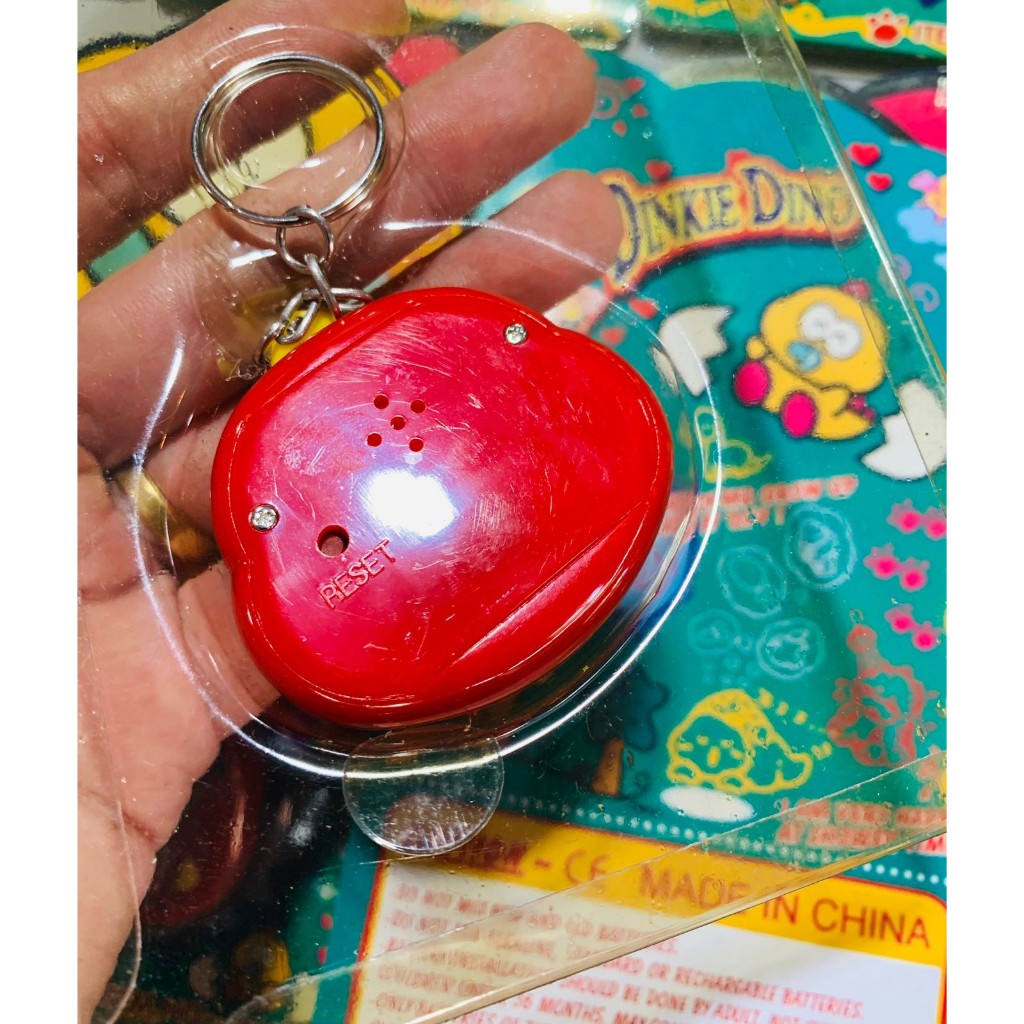 Tamagotchi Bichinho Virtual Dinkie Dino Original (versão americana