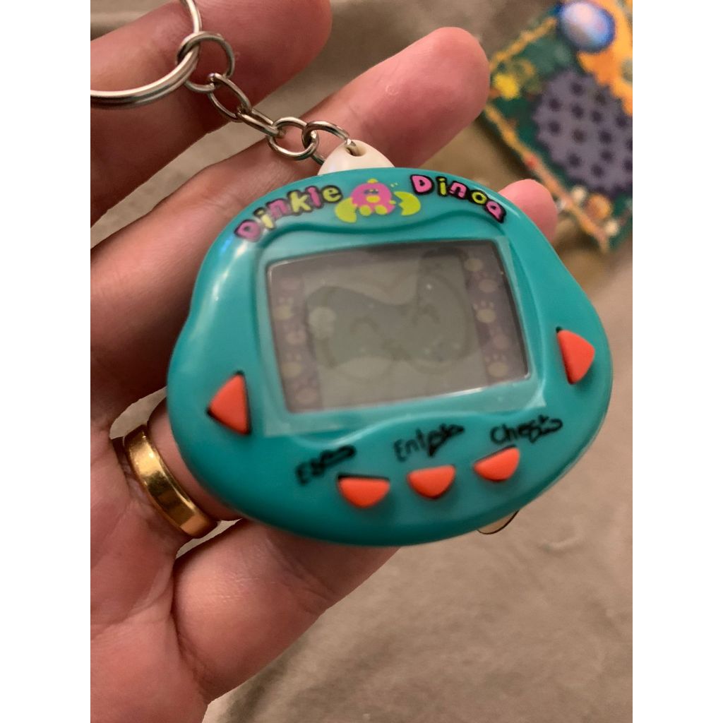 Tamagotchi Bichinho Virtual Dinkie Dino Original (versão americana