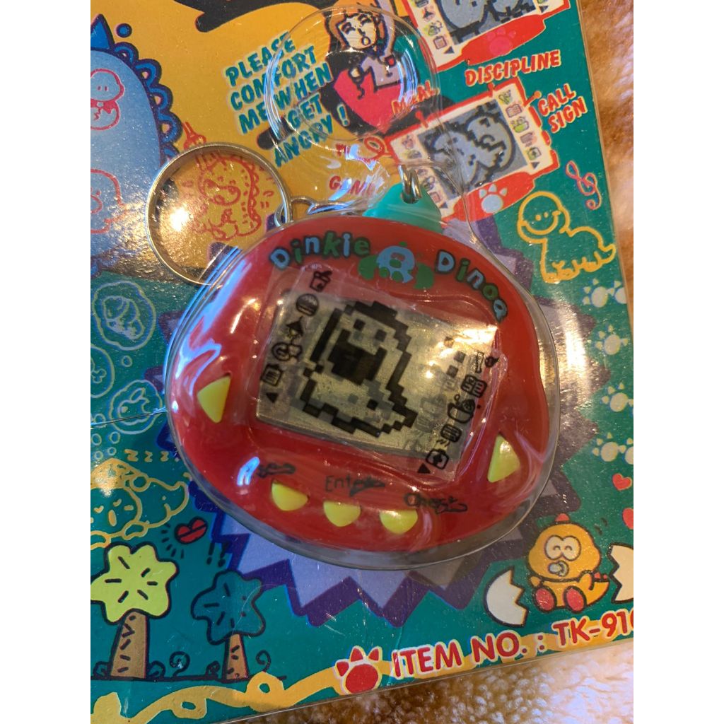 Tamagotchi Bichinho Virtual Dinkie Dino Original (versão americana