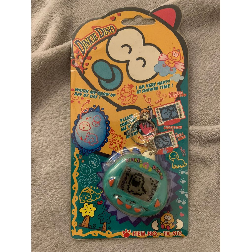 Tamagotchi Bichinho Virtual Dinkie Dino Original (versão americana