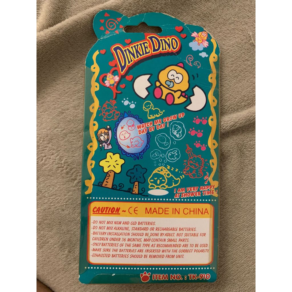 Tamagotchi Bichinho Virtual Dinkie Dino Original (versão americana