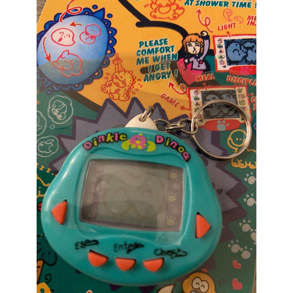 Tamagotchi Bichinho Virtual Dinkie Dino Original (versão americana