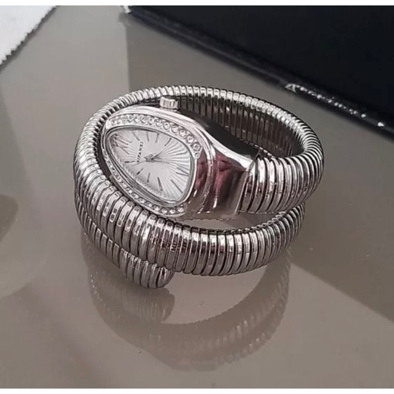 Relogio feminino serpente em aço .