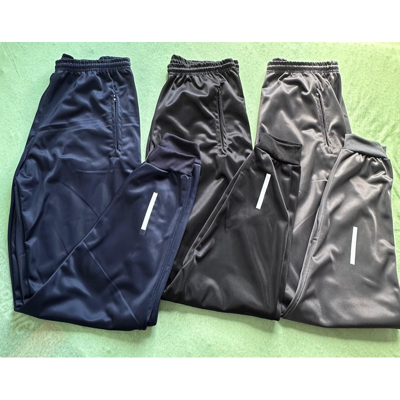 KIT E UNITARIA CALÇA JOGGER MASCULINAS PARA TRABALHAR E ACADEMIA ESPORTIVA COM SIMBOLO REFLETIVO QUE BRILHA NO FLASH- - Faz a Boa!