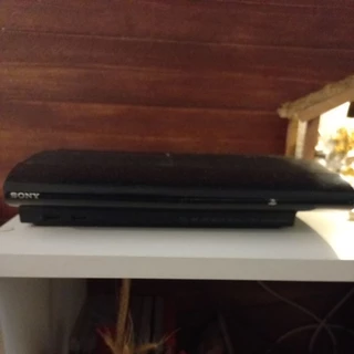 Ps3 slim em ótimo estado 11 jogos + 2 joysticks