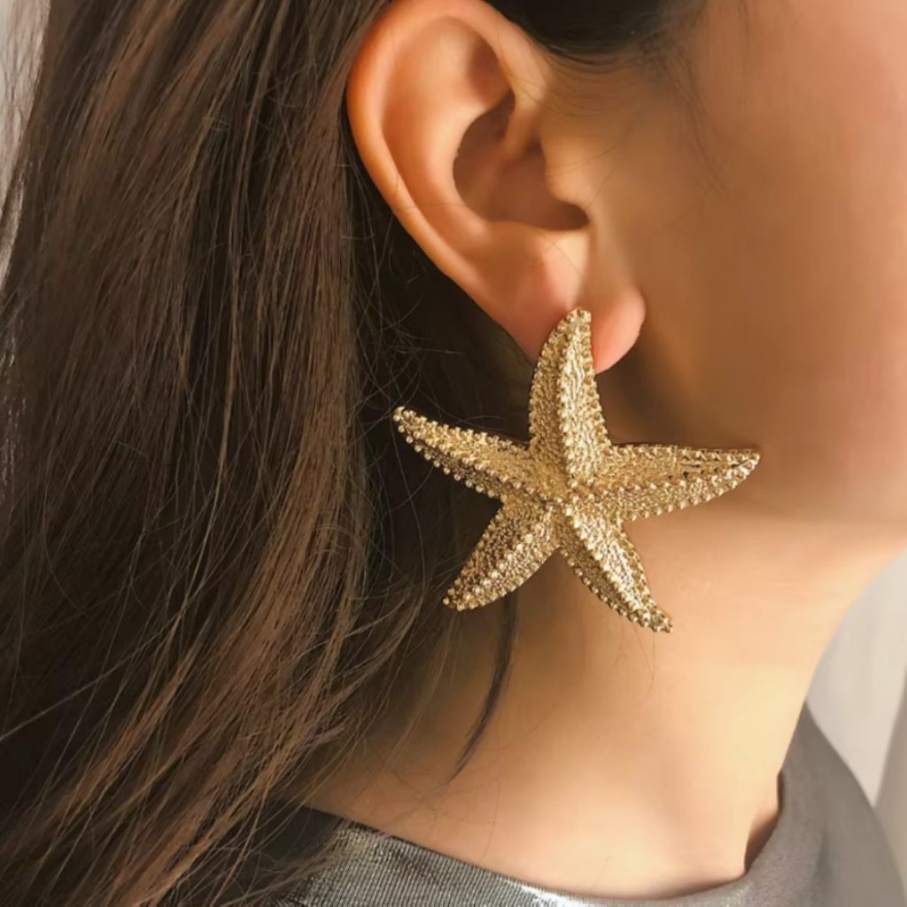 Brinco feminino dourado estrela do mar grande metal moda praia