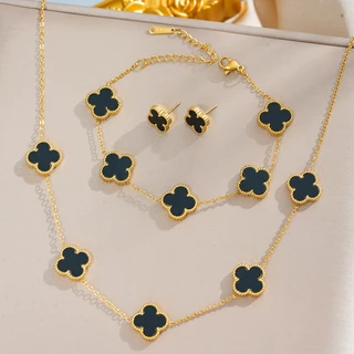 Conjunto de três peças de colar, pulseira e brincos de trevo de quatro folhas em aço titânio 18K. Folheado de madrepérol