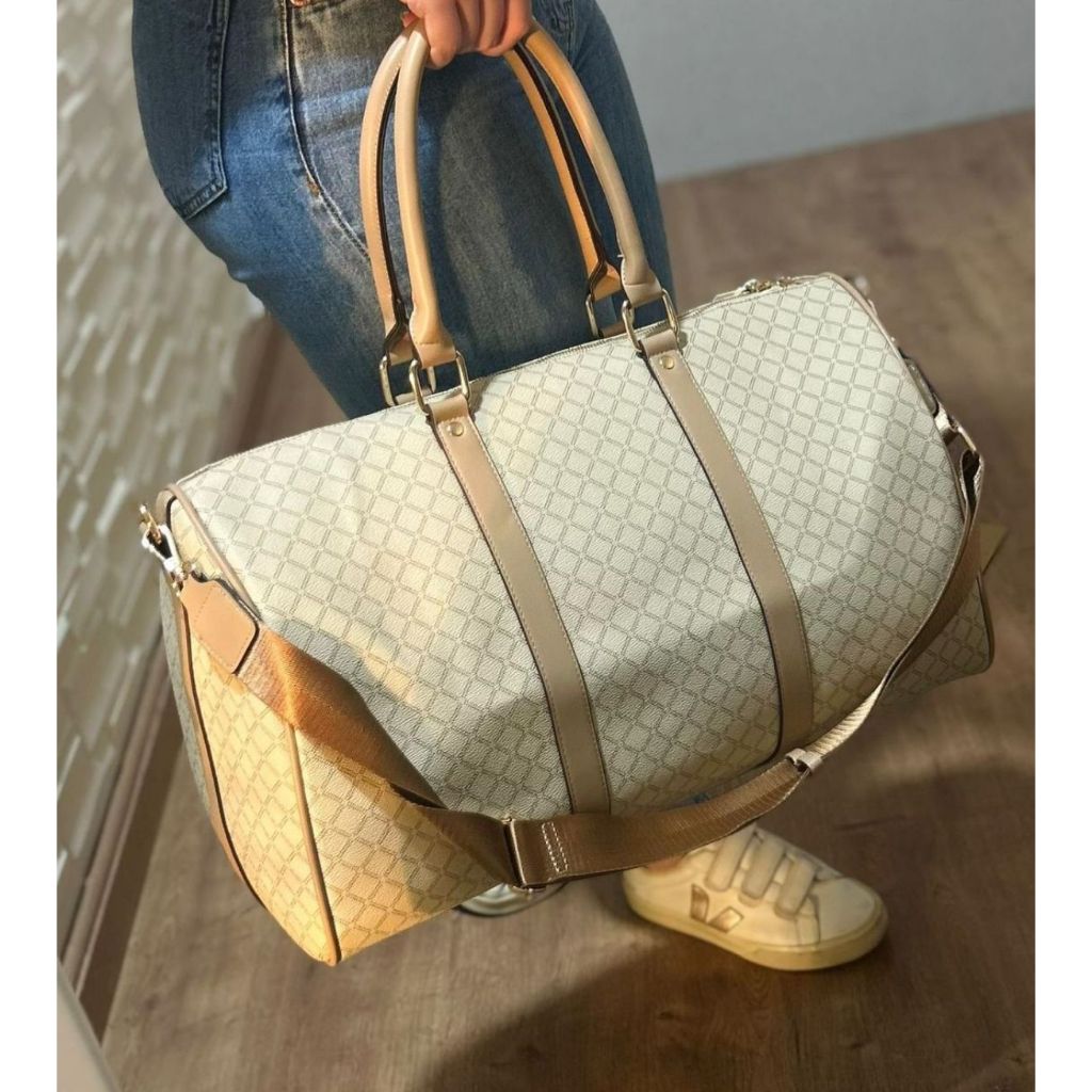 mala-de-m-o-grande-luxuosa-com-estampa-exclusiva-e-detalhes-dourados